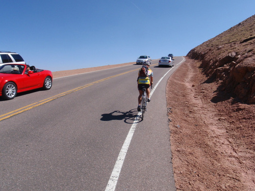 A cyclist actually says 'see ya at the top'.